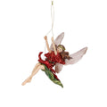 Goodwill M&G A hanging fairy Christmas ornament with translucent pink wings, a red dress, green leaf accents, and a small gold hanging loop, 11,5 cm, shown against a plain white background.