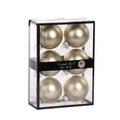 Six matte taupe grey (light metallic) glass Christmas ornaments 7 cm diameter, inside a clear rectangular display box with a black frame and a black band label reading 'Goodwill M&G Co. Glass Baubles'.