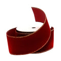 A roll of wide red velvet ribbon with a decorative gold metallic edge, shown on a clean white background.