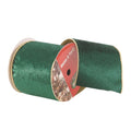 A roll of dark green satin ribbon with a gold edge, shown on a white background with its red and white paper core visible.