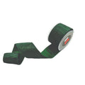 A roll of dark green glitter ribbon with a metallic sheen, partially unrolled on a plain white background.