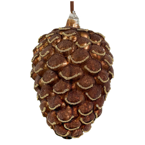 A pinecone-shaped glass Christmas ornament with a metallic bronze finish and textured gold glitter accents along the scales, hanging against a plain white background.