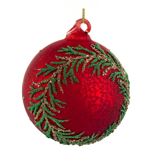 A  aged deep red Christmas ornament bauble, decorated with green beaded pine branches and gold glitter accents, featuring a gold hanging loop at the top.